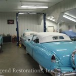 Closeup view of cars under repair