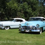 Close view of white and blue color cars in garden