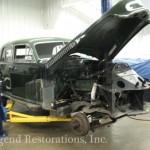 Vintage green color car for repair on the display