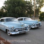 Blue color cars parked side by side