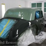 Vintage green color car for repair on the display