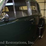 Closeup of vintage green color car on the display