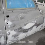 Damaged gray car on the display