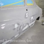 Closeup view of ash color damaged car on the display